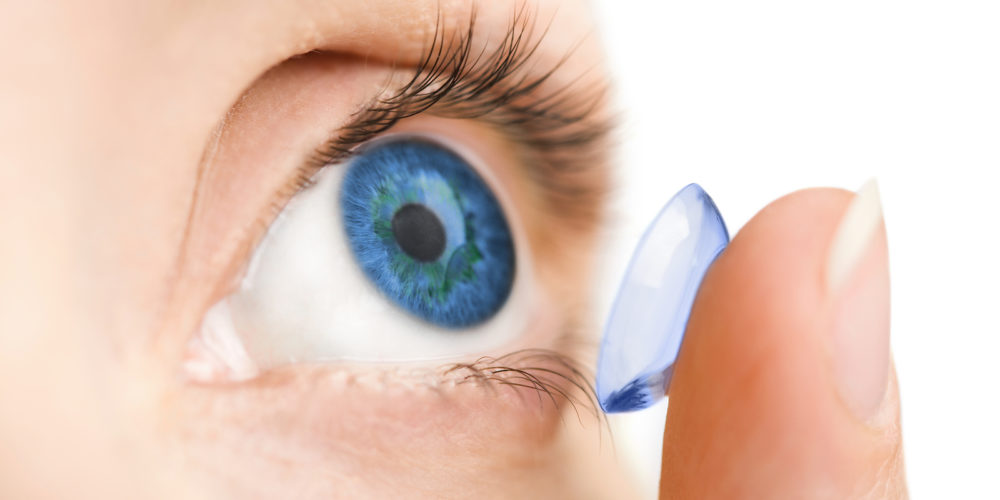 beautiful human eye and contact lens isolated