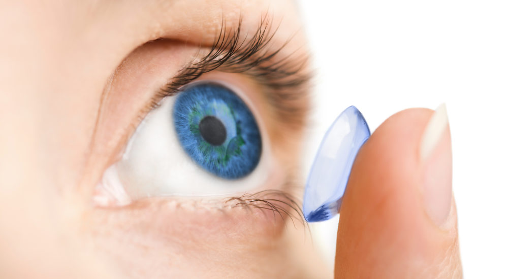 beautiful human eye and contact lens isolated